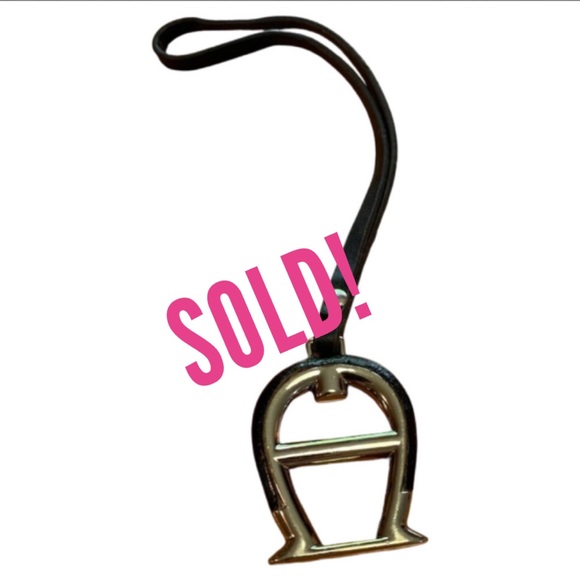 Etienne Aigner Handbags - SOLD! ETIENNE AIGNER Silver/Black Signature Hang Tag Purse Charm (808)
